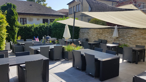 Restaurant pizzeria avec grill au feu de bois et terrasse au calme situé à Champagnole dans le Jura.